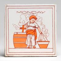 A tile featuring an illustration of a child in a bonnet and dress, using a washboard and bucket. Steam rises from the washboard. The word "Monday" is printed above. The artwork is in monochrome orange.