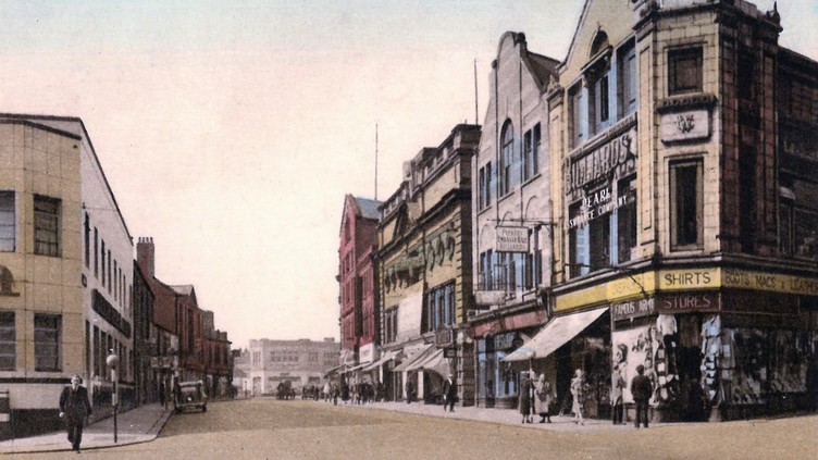 Looking down Eldon Street from the bus station, with buildings either side of the road, circa 1930s