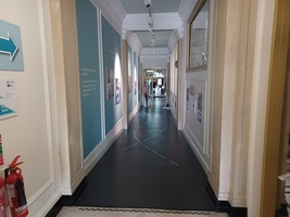 Corridor leading down to Experience Barnsley Museum showing the main gallery in the background.