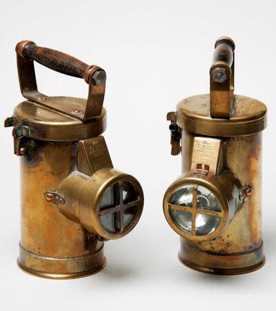 two bronze ceag lamps